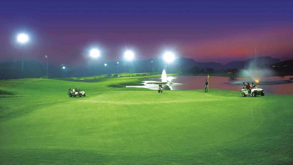 Aamby Valley City Lonavala Buitenkant foto Golf course at night