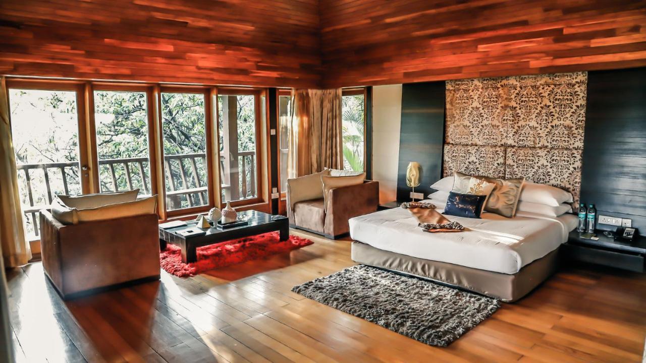 Aamby Valley City Lonavala Buitenkant foto A bedroom at the Taj Bengal